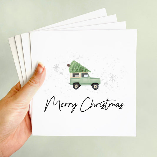 A pack of 4 Christmas Cards featuring a Light Green 4x4 Land Rover Inspired Classic Car. It also comes in packs of 8 and 12.