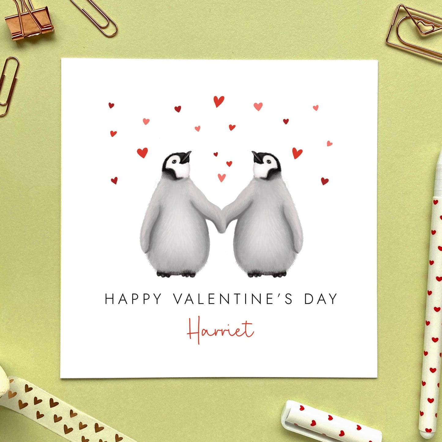 A personalised Valentine's Day card featuring two cute baby penguins.