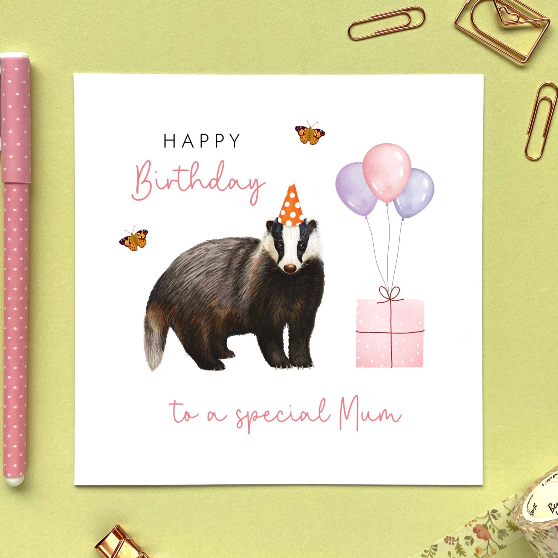 A personalised birthday card for her featuring a british badger. The card in the photo is a birthday card for Mum.