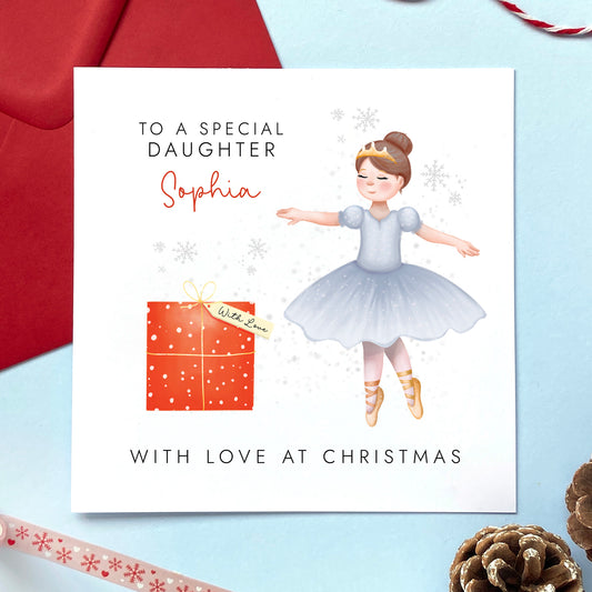 A personalised Christmas Card for Little Girls featuring a Ballerina. You can choose from a range of female relations such as Daughter, Granddaughter, Niece and Sister. It can be customised with a name. The card in the photo is a Christmas Card for Daughter.