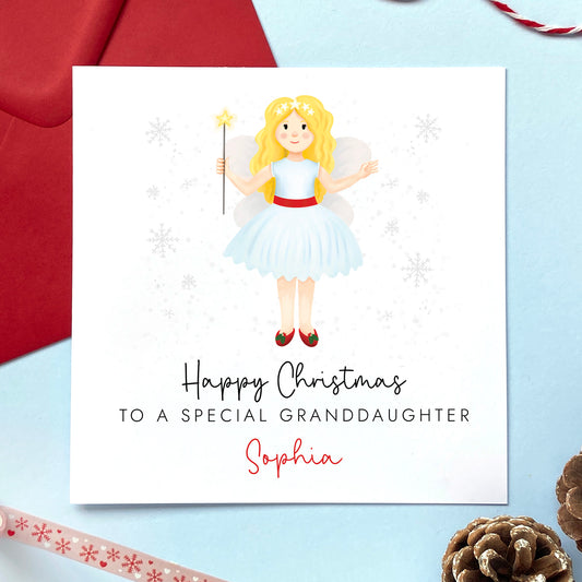 A personalised Christmas card for Granddaughter featuring a festive themed fairy with blonde hair. It can be personalised with a name.