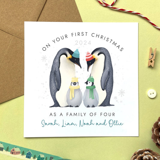 A personalised Christmas Card for 'on your first Christmas as a family of four'.