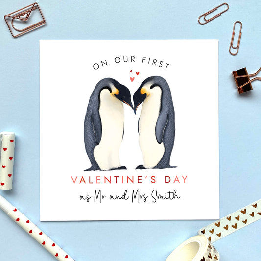 A personalised penguins valentine's day card for first valentine's day married. The wording can be changed to on our first valentine's day as mr and mrs, mr and mr, or mrs and mrs, along with the surname.