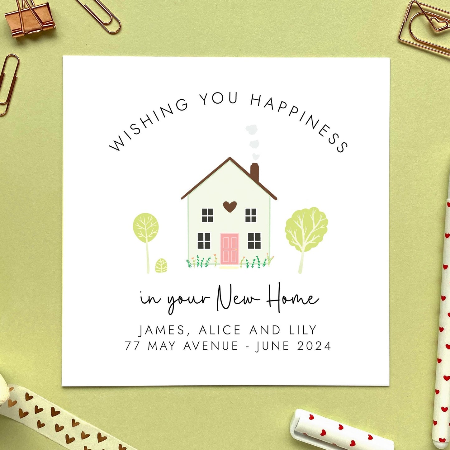 A personalised New Home card featuring the text 'Wishing you happiness in your New Home'. It can be customised with their names, address and moving date.