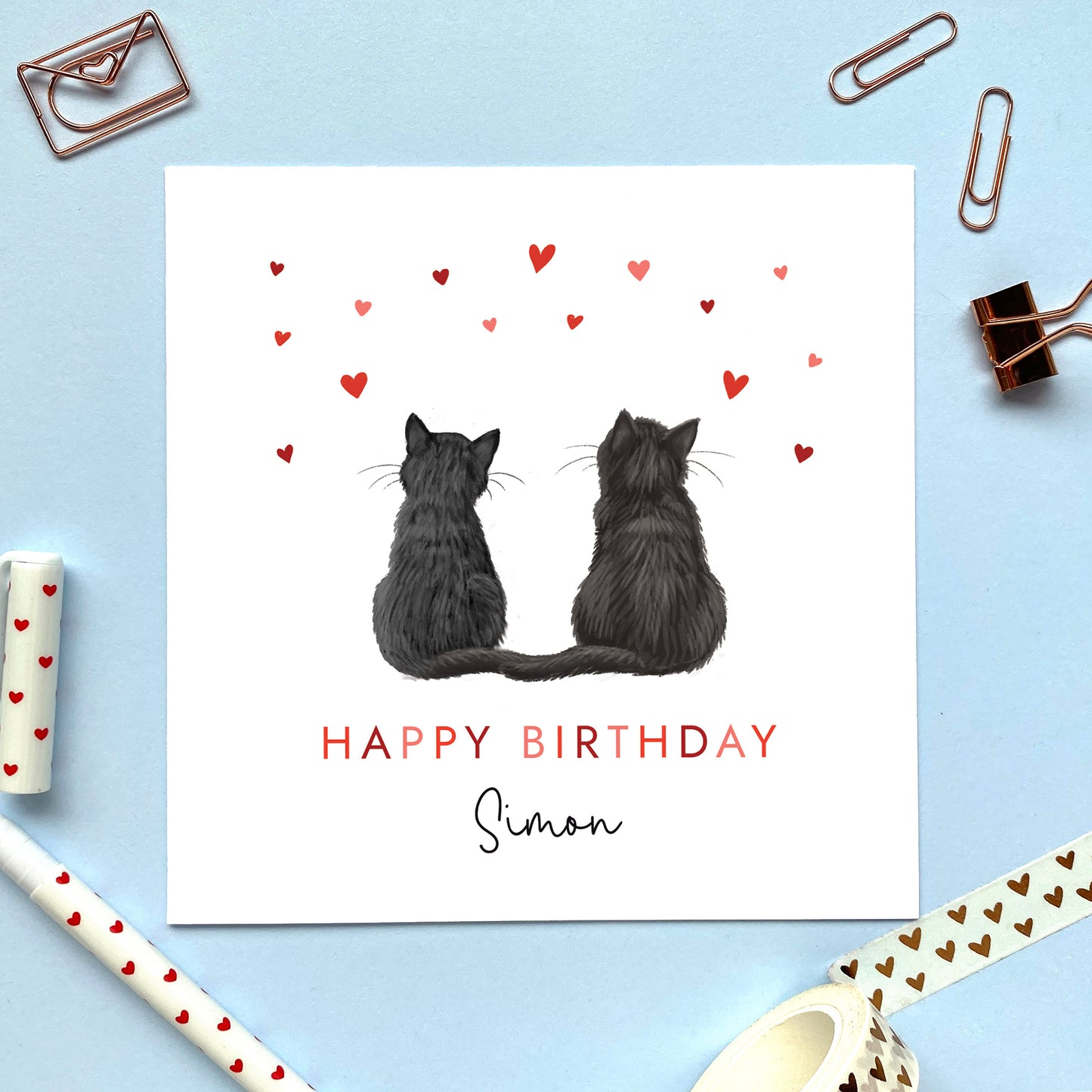 A personalised cats birthday card for partner where you can choose the two cats on the card. You can choose from a range of different cat breeds and colours, including ginger, black, tabby, ragdoll, grey and bengal cats. It can be personalised with any name. Ideal for both him and her, fiancee, fiance, husband, wife, boyfriend or girlfriend. The photo shows two black cats.