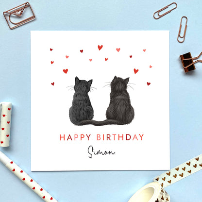 A personalised cats birthday card for partner where you can choose the two cats on the card. You can choose from a range of different cat breeds and colours, including ginger, black, tabby, ragdoll, grey and bengal cats. It can be personalised with any name. Ideal for both him and her, fiancee, fiance, husband, wife, boyfriend or girlfriend. The photo shows two black cats.