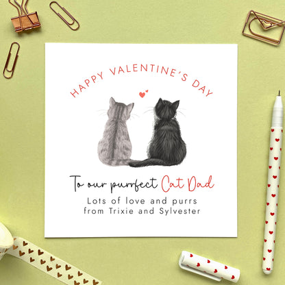 A personalised from two cats valentines day card for Cat Dad.